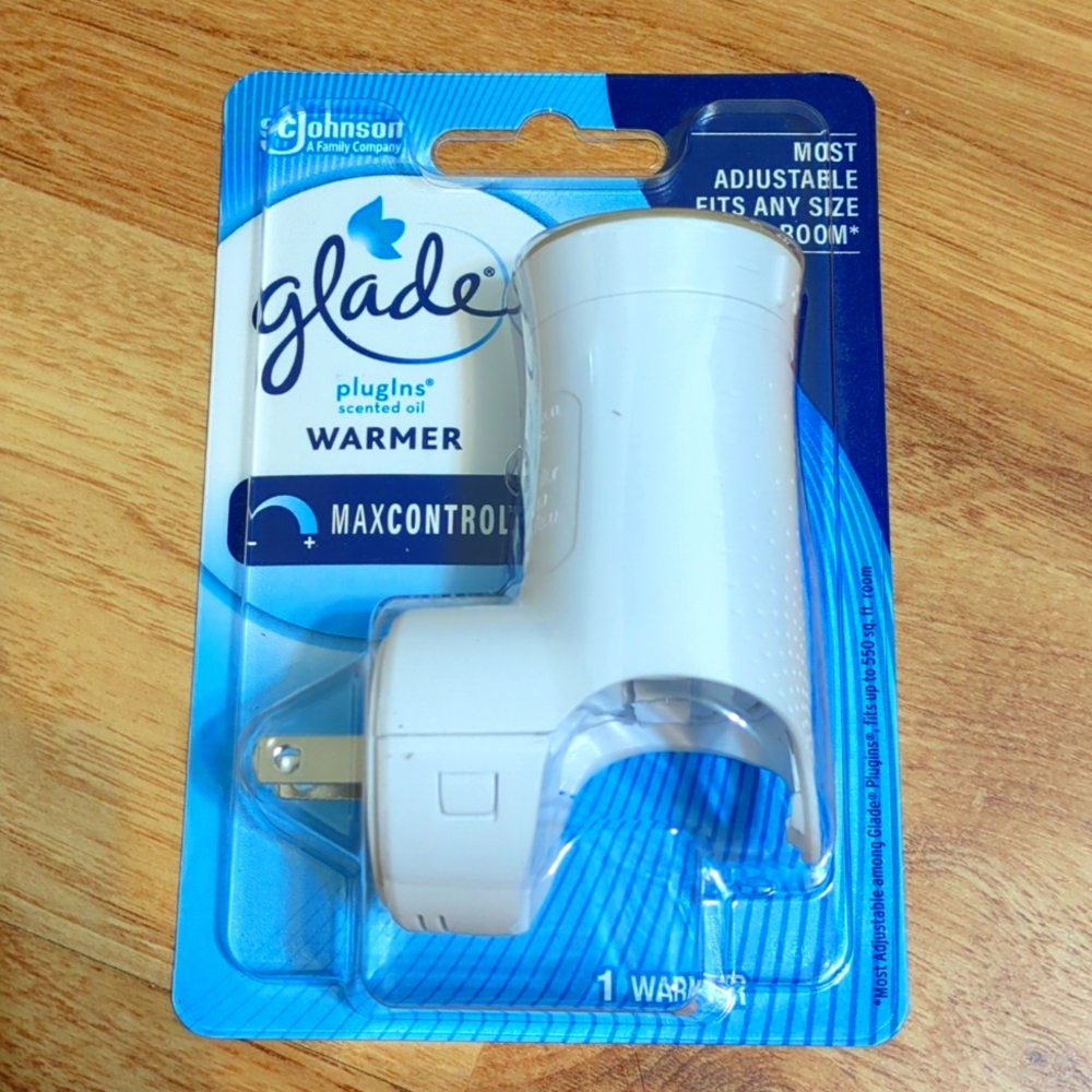 Brand new Glade plug-in scented oil warmer